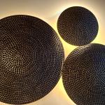 Yellow brass plates for wall decoration.