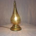 posed copper lamp